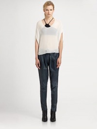 Supple leather silhouette transforms these pleated pants into a sophisticated style statement. Waist self-tieFront pleatingRise, about 11Inseam, about 29About 22 from shoulder to hemLeatherDry clean with leather specialistImported of Italian fabricModel shown is 5'11 (178cm) wearing US size 4. Supple leather silhouette transforms these pleated pants into a sophisticated style statement. Waist self-tieFront pleatingRise, about 11Inseam, about 29About 22 from shoulder to hemLeatherDry clean with leather specialistImported of Italian fabricModel shown is 5'11 (178cm) wearing US size 4.