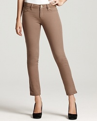 Streamline your silhouette in DL1961's skinny, ankle-length jeans, articulated in a chic neutral hue. Streamline your silhouette in DL1961's skinny, ankle-length jeans, articulated in a chic neutral hue.
