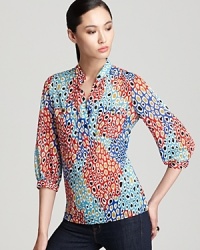 An artistic, multi-colored leopard print invigorates this elegant Trina Turk blouse with sheer animal magnetism--it's no wonder why it's fall's most trend-worthy look. An artistic, multi-colored leopard print invigorates this elegant Trina Turk blouse with sheer animal magnetism--it's no wonder why it's fall's most trend-worthy look.