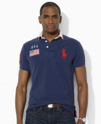 Updated with tonal heritage embroidery for the look of a vintage favorite, this trim-fitting rugby offers superior comfort and athletic style in lightweight cotton mesh. Updated with tonal heritage embroidery for the look of a vintage favorite, this trim-fitting rugby offers superior comfort and athletic style in lightweight cotton mesh.