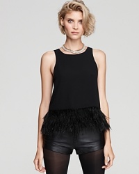 Feather trim takes the tame tank to style heights with this on-trend top from Blaque Label. Crafted from silk to perfectly drape over mini shorts or skinnies, it's a club must. Feather trim takes the tame tank to style heights with this on-trend top from Blaque Label. Crafted from silk to perfectly drape over mini shorts or skinnies, it's a club must.