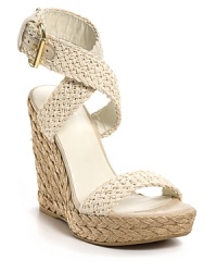 Stuart Weitzman Alex crochet espadrilles. Woven wrap ankle strap with adjustable buckle closure. 4.5 braided straw covered wedge with 1 platform. Stuart Weitzman Alex crochet espadrilles. Woven wrap ankle strap with adjustable buckle closure. 4.5 braided straw covered wedge with 1 platform.