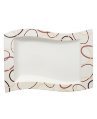 Warm, autumn rings dance along the wavy border of this generous gourmet plate. With sleek, artful shapes, the New Wave Ethno dinnerware collection helps make any meal extraordinary. Warm, autumn rings dance along the wavy border of this generous gourmet plate. With sleek, artful shapes, the New Wave Ethno dinnerware collection helps make any meal extraordinary.