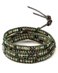Simple yet eclectic. This Chan Luu leather wrap bracelet refines bohemian style with its mix of semi-precious gemstones. Simple yet eclectic. This Chan Luu leather wrap bracelet refines bohemian style with its mix of semi-precious gemstones.