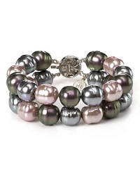 Luminous and versatile. Pearls are always a classic, and this multi-tonal layered bracelet from Majorica is a statement-making way to wear them. Luminous and versatile. Pearls are always a classic, and this multi-tonal layered bracelet from Majorica is a statement-making way to wear them.