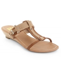 Straps on straps on straps! Tommy Hilfiger's Merci wedge sandals aren't your average dainty t-strap. Metal hardware detailing keeps these cute wedges nice and rugged. Straps on straps on straps! Tommy Hilfiger's Merci wedge sandals aren't your average dainty t-strap. Metal hardware detailing keeps these cute wedges nice and rugged.