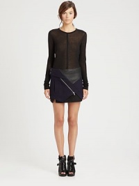 Panel-constructed for an edgy, architectural look, this structured mini features a supple leather inset detail.Side snap tap closureAsymmetrical front zipFront welt pocketAsymmetrical hemline and overlayAbout 15 longCotton/leather/silk failleDry cleanMade in ItalyModel shown is 5'10 (177cm) wearing US size 4. Panel-constructed for an edgy, architectural look, this structured mini features a supple leather inset detail.Side snap tap closureAsymmetrical front zipFront welt pocketAsymmetrical hemline and overlayAbout 15 longCotton/leather/silk failleDry cleanMade in ItalyModel shown is 5'10 (177cm) wearing US size 4.