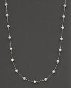 Beaded 14 Kt. white gold necklace with fresh water pearl stations.