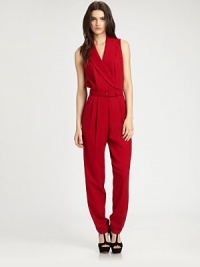 Featherweight wool suiting, impeccably tailored from head-to-toe in a belted one-piece.Shawl collarSleevelessCrossover bodiceBelted waistPleated frontSlash pocketsSheer backAbout 65 from shoulder to hemWoolDry cleanImportedModel shown is 5'9½ (176cm) wearing US size 4.This style runs true to size. We recommend ordering your usual size for a standard fit. Featherweight wool suiting, impeccably tailored from head-to-toe in a belted one-piece.Shawl collarSleevelessCrossover bodiceBelted waistPleated frontSlash pocketsSheer backAbout 65 from shoulder to hemWoolDry cleanImportedModel shown is 5'9½ (176cm) wearing US size 4.This style runs true to size. We recommend ordering your usual size for a standard fit.