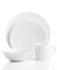 Inspired by the architecture of the famous Louvre Museum in Paris, this Bernardaud place setting is engraved with sweeping scrolls, fluting and other inspired sculptural details. Crafted in the exquisite white porcelain of the Lourve dinnerware collection. Inspired by the architecture of the famous Louvre Museum in Paris, this Bernardaud place setting is engraved with sweeping scrolls, fluting and other inspired sculptural details. Crafted in the exquisite white porcelain of the Lourve dinnerware collection.