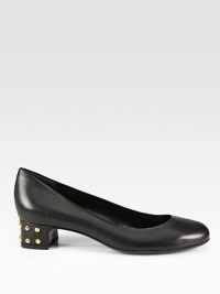Low-cut leather silhouette with a studded heel. Leather and metal studded heel, 1¼ (30mm)Leather upperLeather lining and solePadded insoleMade in ItalyOUR FIT MODEL RECOMMENDS ordering true size. Low-cut leather silhouette with a studded heel. Leather and metal studded heel, 1¼ (30mm)Leather upperLeather lining and solePadded insoleMade in ItalyOUR FIT MODEL RECOMMENDS ordering true size.