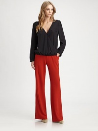 The classic wide-leg silhouette articulated in vibrant twill and styled with a shape-defining high waist.Tab-front waistBelt loopsZip-flyFlat frontSlash pocketsBack welt pocketsRise, about 9Inseam, about 34PolyesterDry cleanImportedModel shown is 5'9 (175cm) wearing US size 4. The classic wide-leg silhouette articulated in vibrant twill and styled with a shape-defining high waist.Tab-front waistBelt loopsZip-flyFlat frontSlash pocketsBack welt pocketsRise, about 9Inseam, about 34PolyesterDry cleanImportedModel shown is 5'9 (175cm) wearing US size 4.