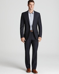 Look impeccable from head to toe in this striking suit from HUGO BOSS, crafted in seasonless wool for versatile year-round wear. Look impeccable from head to toe in this striking suit from HUGO BOSS, crafted in seasonless wool for versatile year-round wear.
