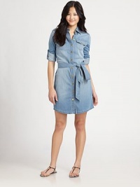 Signature gold-tone buttons and shirt-tailored details define this soft denim style.Shirt collarEpaulettesButton frontPatch flap pocketsLong sleeves with button cuffs and roll-tab detailsSelf sash beltCurved, vented hemlineAbout 37 from shoulder to hem98% cotton/2% spandexMachine washImportedModel shown is 5'10 (177cm) wearing US size 4.OUR FIT MODEL RECOMMENDS ordering true size. Signature gold-tone buttons and shirt-tailored details define this soft denim style.Shirt collarEpaulettesButton frontPatch flap pocketsLong sleeves with button cuffs and roll-tab detailsSelf sash beltCurved, vented hemlineAbout 37 from shoulder to hem98% cotton/2% spandexMachine washImportedModel shown is 5'10 (177cm) wearing US size 4.OUR FIT MODEL RECOMMENDS ordering true size.