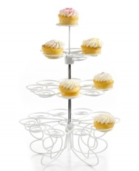 Show off your sweet side! Create a fun and dainty display of your mini cupcakes with this coated metal stand. Holding up to 24 cupcakes in a tree-like design, this stand features a charming spiral design to hold each cupcake in place, making it the perfect accent for serving up sweets & treats at any party. Show off your sweet side! Create a fun and dainty display of your mini cupcakes with this coated metal stand. Holding up to 24 cupcakes in a tree-like design, this stand features a charming spiral design to hold each cupcake in place, making it the perfect accent for serving up sweets & treats at any party.
