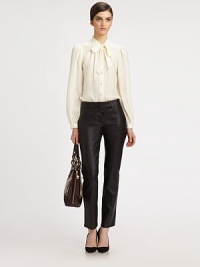 Show some urban attitude in lustrous leather pants with cropped-leg construction and back besom pockets. Button closureZip flyBack besom pocketsRise, about 8Inseam, about 28LeatherDry clean with leather specialistMade in USA of imported fabricModel shown is 5'10 (177cm) wearing US size 2. Show some urban attitude in lustrous leather pants with cropped-leg construction and back besom pockets. Button closureZip flyBack besom pocketsRise, about 8Inseam, about 28LeatherDry clean with leather specialistMade in USA of imported fabricModel shown is 5'10 (177cm) wearing US size 2.