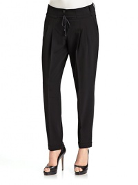 THE LOOKWide waistband with tonal ribbed inserts Drawstring tie below the buttons Dual button closure with front zipper Pleated front Slash side pockets with ribbed trim Tapered legs Back button welt pocketsTHE FITRise, about 9 Inseam, about 28THE MATERIAL90% polyester/10% polyurethaneCARE & ORIGINMachine wash Imported THE LOOKWide waistband with tonal ribbed inserts Drawstring tie below the buttons Dual button closure with front zipper Pleated front Slash side pockets with ribbed trim Tapered legs Back button welt pocketsTHE FITRise, about 9 Inseam, about 28THE MATERIAL90% polyester/10% polyurethaneCARE & ORIGINMachine wash Imported