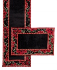 In a richly textured blend, the Poinsettia Border runner by Windham Weavers dresses your table in dramatic holiday fashion. Red blooms and ivory swirls pop on a luxe black ground. In a richly textured blend, the Poinsettia Border runner by Windham Weavers dresses your table in dramatic holiday fashion. Red blooms and ivory swirls pop on a luxe black ground.