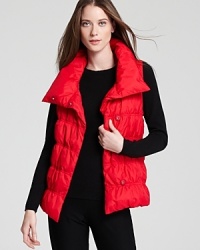 A statement collar and chic quilting infuse a down Eileen Fisher vest with sporty-chic edge. Slip the plush layer over everyday basics and transition seamlessly from city blocks to ski slopes. A statement collar and chic quilting infuse a down Eileen Fisher vest with sporty-chic edge. Slip the plush layer over everyday basics and transition seamlessly from city blocks to ski slopes.