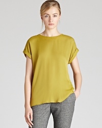 This classic REISS top is an instant wardrobe updater with its back button placket. Pair with flannel pants for an effortlessly elegant office look or with jeans for a more casual approach to the weekend. This classic REISS top is an instant wardrobe updater with its back button placket. Pair with flannel pants for an effortlessly elegant office look or with jeans for a more casual approach to the weekend.