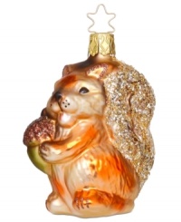 Nutty about Christmas! As cute as can be, this Inge-Glas squirrel ornament is mouth-blown and hand-painted for a signature, well-crafted look. Nutty about Christmas! As cute as can be, this Inge-Glas squirrel ornament is mouth-blown and hand-painted for a signature, well-crafted look.