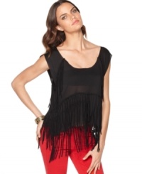 Layered fringe adds a boho-rock look to this boxy Kensie top -- perfect for on-trend spring style! Layered fringe adds a boho-rock look to this boxy Kensie top -- perfect for on-trend spring style!