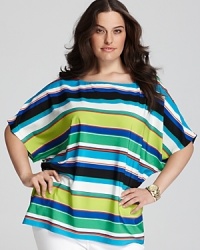 This VINCE CAMUTO tee is designed with slouched dolman sleeves in a modern mix of stripes that pair perfectly with anything from sleek denim to a crisp white skirt. This VINCE CAMUTO tee is designed with slouched dolman sleeves in a modern mix of stripes that pair perfectly with anything from sleek denim to a crisp white skirt.
