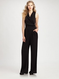 A draped neckline and flattering sash give this silk jumpsuit with a hint of stretch, a beyond-feminine look.Draped v-neckSleevelessPleat details at waistSelf-tie beltConcealed back zipperFully linedAbout 59 from shoulder to hemSilk/spandexDry cleanImported Model shown is 5'10 (177cm) wearing US size 4. OUR FIT MODEL RECOMMENDS ordering true size. 