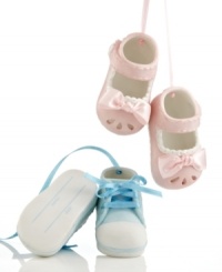 A perfect gift for new parents, baby shoe ornaments from Midwest are crafted of pale pink or blue porcelain with coordinating ribbon. Flip them over to fill out the date and child's name. A perfect gift for new parents, baby shoe ornaments from Midwest are crafted of pale pink or blue porcelain with coordinating ribbon. Flip them over to fill out the date and child's name.