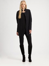 Made from luxurious merino wool, this simply sophisticated coat offers clean lines and an ever-stylish stand collar.Stand collarLong sleevesButton closureConvenient slash pocketsAbout 32 from shoulder to hemBody: merino woolSleeves: merino wool/nylon/spandexDry cleanImported Model shown is 5'10 (177cm) wearing US size Small. Made from luxurious merino wool, this simply sophisticated coat offers clean lines and an ever-stylish stand collar.Stand collarLong sleevesButton closureConvenient slash pocketsAbout 32 from shoulder to hemBody: merino woolSleeves: merino wool/nylon/spandexDry cleanImported Model shown is 5'10 (177cm) wearing US size Small.