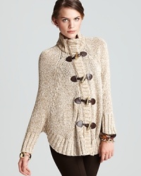 Send your style on a rustic escape in an effortless MICHAEL Michael Kors cardigan touting a toggle closure for heritage appeal. Send your style on a rustic escape in an effortless MICHAEL Michael Kors cardigan touting a toggle closure for heritage appeal.