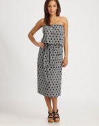 A strapless maxi dress featuring an eye-catching print and waist-cinching belt.Elasticized, strapless topAllover printElasticized waistBelted silhouetteAbout 31 from natural waist95% polyester/5% spandexMachine washImported Model shown is 5'10 (177cm) wearing US size Small. 