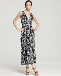 A monochromatic take on animal print, this Shiloh 770 maxi dress takes your style to great lengths. Team with blocky wooden wedges to play up safari-chic. A monochromatic take on animal print, this Shiloh 770 maxi dress takes your style to great lengths. Team with blocky wooden wedges to play up safari-chic.