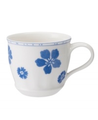 Vintage charm meets modern durability in the Farmhouse Touch teacup, featuring cornflower-blue florals and bands in delicately embossed porcelain from Villeroy & Boch. Vintage charm meets modern durability in the Farmhouse Touch teacup, featuring cornflower-blue florals and bands in delicately embossed porcelain from Villeroy & Boch.