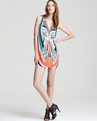 Imbued with an avant-garde print, this Nicole Miller dress is a hyper-modern choice for the party circuit. Imbued with an avant-garde print, this Nicole Miller dress is a hyper-modern choice for the party circuit.