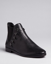 Get this season's must-have booties with an edge: triangular stud details; from retro style resource House of Harlow 1960. Get this season's must-have booties with an edge: triangular stud details; from retro style resource House of Harlow 1960.
