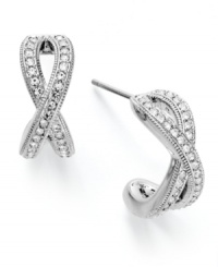 Eliot Danori reveals a stylish twist with this pair of drop earrings. Crafted from rhodium-plated brass, the earrings sparkle with crystal accents. Approximate drop: 1 inch. Eliot Danori reveals a stylish twist with this pair of drop earrings. Crafted from rhodium-plated brass, the earrings sparkle with crystal accents. Approximate drop: 1 inch.