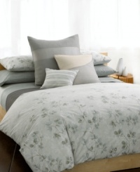 Serenity now. Create a calm atmosphere of luxury with the Quince comforter from Calvin Klein. A watercolor print of stone and green florals adorns this ultra-soft comforter in 100% pure combed cotton percale, evoking the essence of natural beauty with a purely modern allure. Self reversing. (Clearance) Serenity now. Create a calm atmosphere of luxury with the Quince comforter from Calvin Klein. A watercolor print of stone and green florals adorns this ultra-soft comforter in 100% pure combed cotton percale, evoking the essence of natural beauty with a purely modern allure. Self reversing. (Clearance)