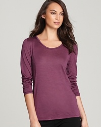 Blending soft cotton with sumptuous silk, this Eileen Fisher tee takes your essential layers to luxe status. Blending soft cotton with sumptuous silk, this Eileen Fisher tee takes your essential layers to luxe status.