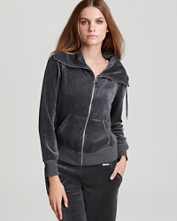 Laid-back luxury is embodied in this MICHAEL Michael Kors velour jacket, designed with a chic funnel neck and gleaming silver-tone hardware. Laid-back luxury is embodied in this MICHAEL Michael Kors velour jacket, designed with a chic funnel neck and gleaming silver-tone hardware.