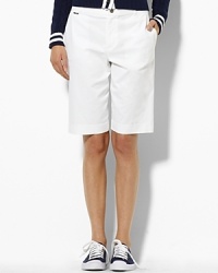 A seasonal essential is chic and effortless in sleek stretch cotton and is accented with polished metal hardware. A seasonal essential is chic and effortless in sleek stretch cotton and is accented with polished metal hardware.