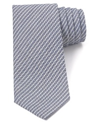 Demonstrate your sartorial wisdom with a classic tie featuring simple stripes from Armani Collezioni. Demonstrate your sartorial wisdom with a classic tie featuring simple stripes from Armani Collezioni.