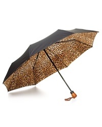 Adrienne Landau's compact umbrella is small enough to fit in your bag, but bold enough to make a statement. Adrienne Landau's compact umbrella is small enough to fit in your bag, but bold enough to make a statement.