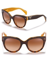 Invest in the forever sunglass like these round wayfarer shades from Prada.