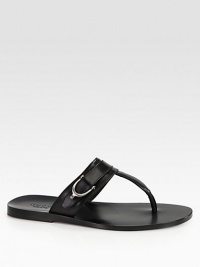 Leather thong sandal with silver palladium hardware.Stirrup detailLeather soleMade in Italy Leather thong sandal with silver palladium hardware.Stirrup detailLeather soleMade in Italy