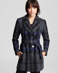A dark palette and modern check print infuse a classic Burberry Brit wool coat with contemporary edge. Layer over luxe leather leggings for look brimming with downtown attitude. A dark palette and modern check print infuse a classic Burberry Brit wool coat with contemporary edge. Layer over luxe leather leggings for look brimming with downtown attitude.