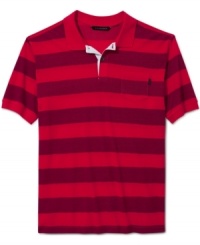 Sporty meets stylish. This striped polo shirt from Sean John scores big in your casual wardrobe.