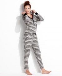 Warm and snuggly from head to toe. Kensie's hooded jumpsuit features contrasting cuffs and placket with a snap closure. Warm and snuggly from head to toe. Kensie's hooded jumpsuit features contrasting cuffs and placket with a snap closure.