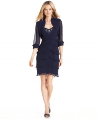 A blouse-like jacket with rhinestone-buttoned cuffs and sheer sleeves adds extra allure to this beaded, tiered petite dress by SL Fashions. A blouse-like jacket with rhinestone-buttoned cuffs and sheer sleeves adds extra allure to this beaded, tiered petite dress by SL Fashions.
