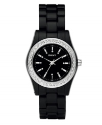 Starry night sky style, by DKNY. Watch crafted of black plastic bracelet and round case. Stainless steel bezel embellished with crystal accents. Black dial features silver tone stick indices, crystal accents at markers, minute track, three hands and logo. Quartz movement. Water resistant to 50 meters. Two-year limited warranty. Starry night sky style, by DKNY. Watch crafted of black plastic bracelet and round case. Stainless steel bezel embellished with crystal accents. Black dial features silver tone stick indices, crystal accents at markers, minute track, three hands and logo. Quartz movement. Water resistant to 50 meters. Two-year limited warranty.
